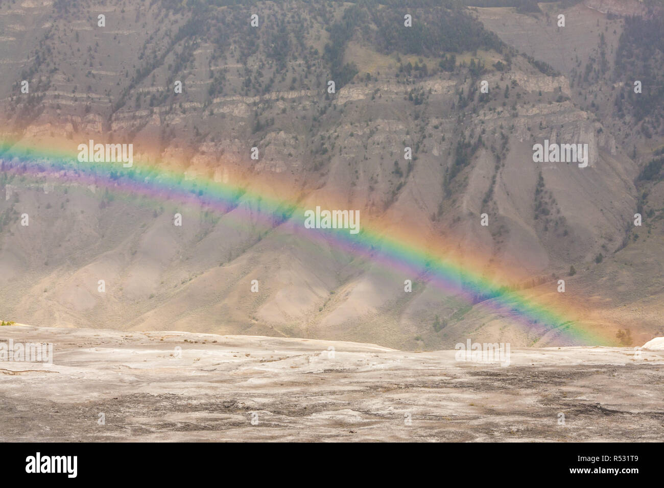 Rainbow at Mammoth Springs Stock Photo