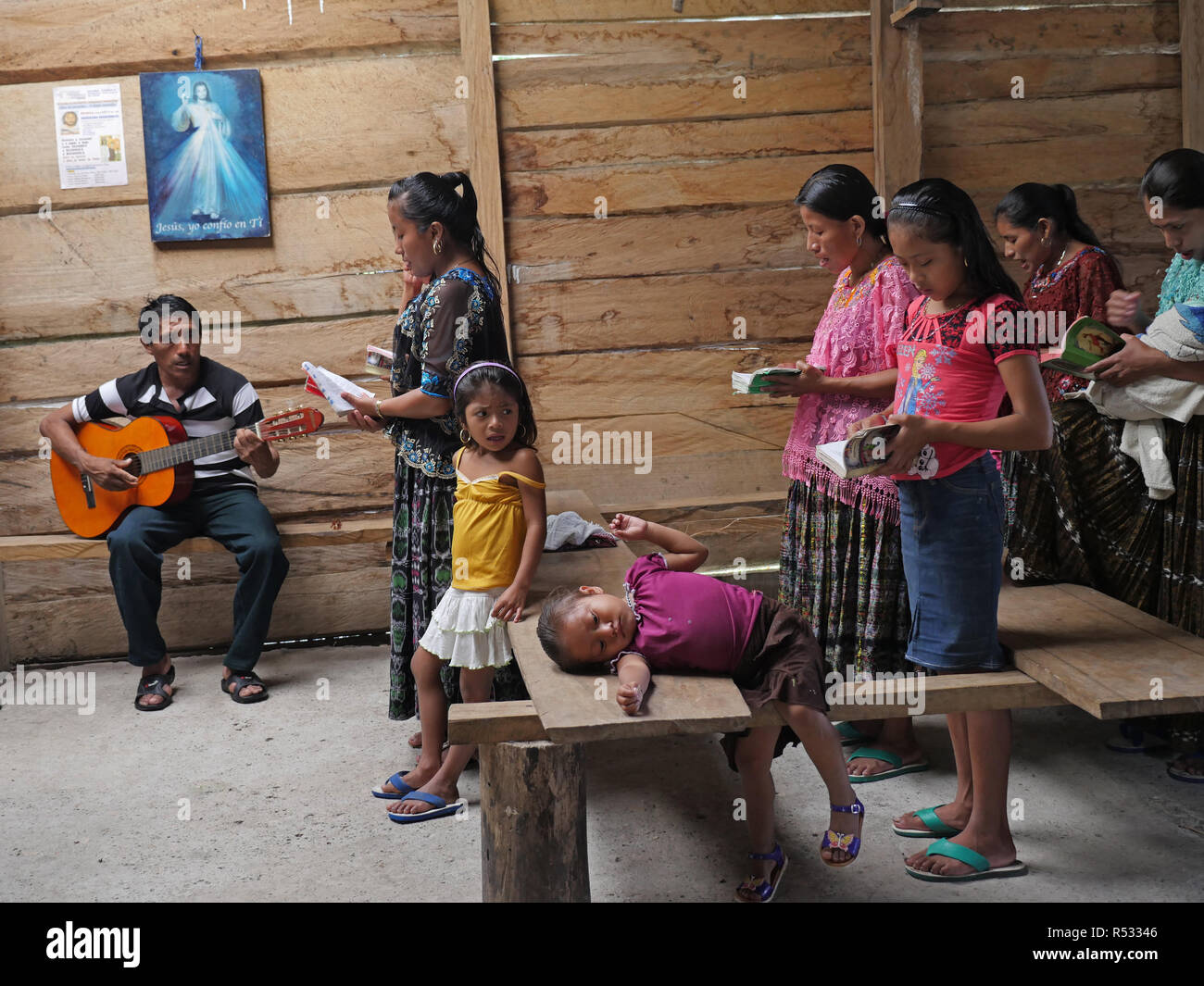 GUATEMALA  Father William Mullen MM saying mass to Q'eqchi Indians at Limon village, near El Remate, Peten. Stock Photo