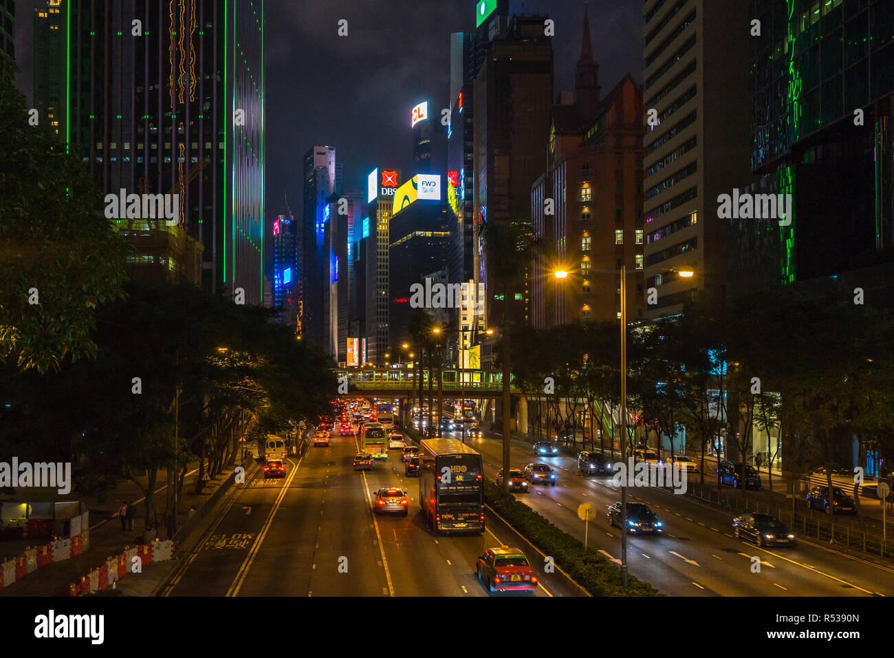 Night view of skyscrapers on Gloucester road one of the busiest streets in Wan Chai district. Hong Kong, January 2018 Stock Photo