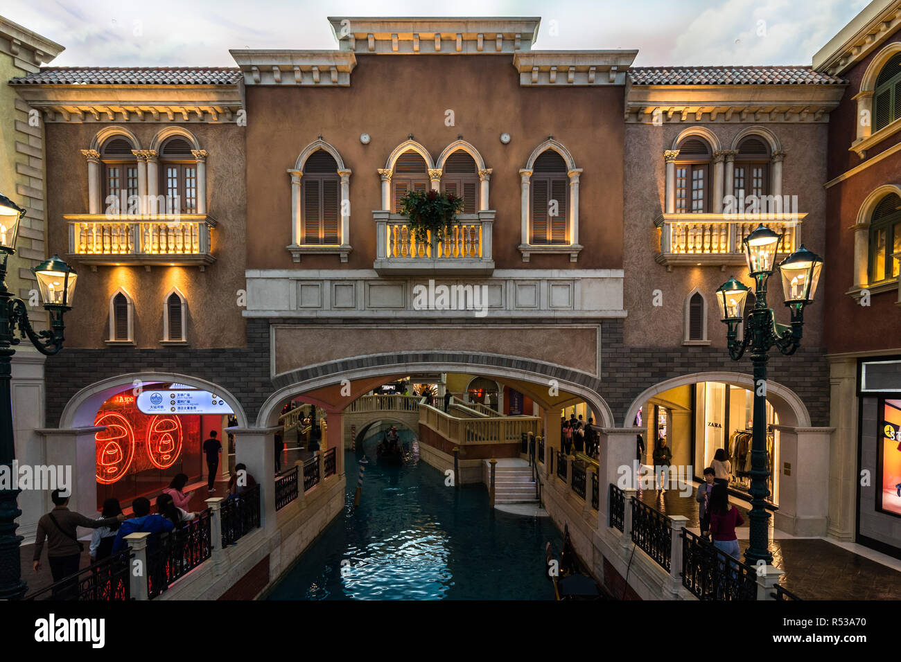 Shopping mall inside The Venetian Casino, with buildings and canals in Venice style. Macau, January 2018 Stock Photo