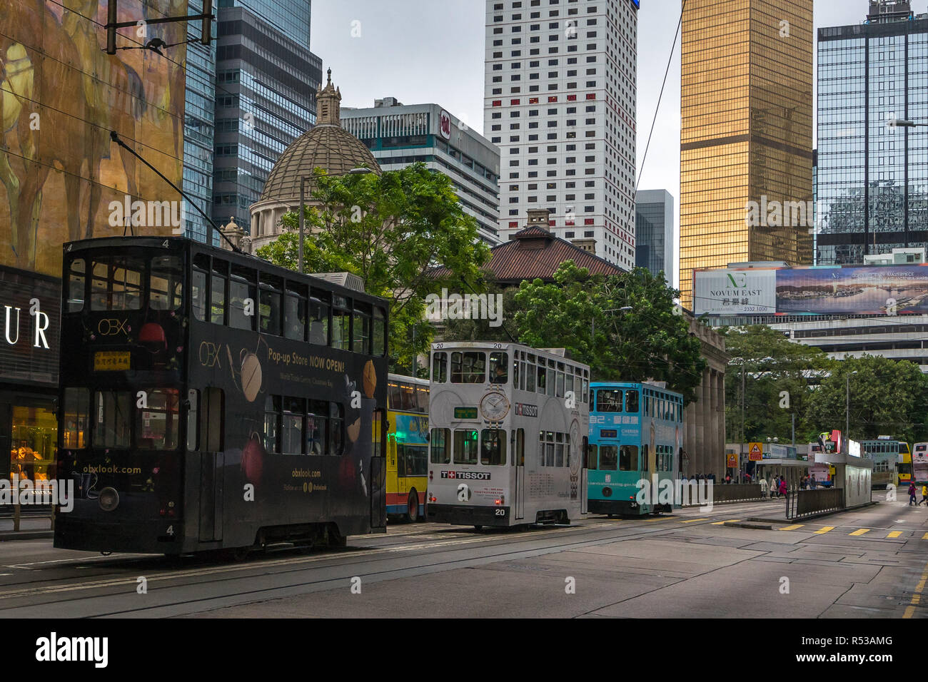 Row of typical Hong Kong double-decker trams, also known as Ding Ding in Statue Square. Hong Kong, Central, January 2018 Stock Photo