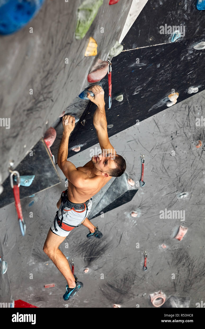 Male professional climber at indoor workout at bouldering centre Stock Photo Alamy
