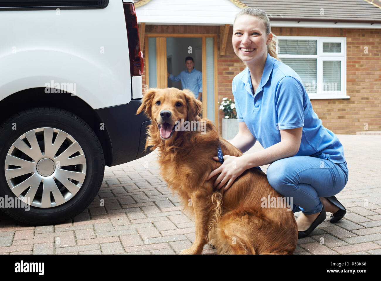 Portrait Of Woman With Van Running Dog Walking Service Stock Photo