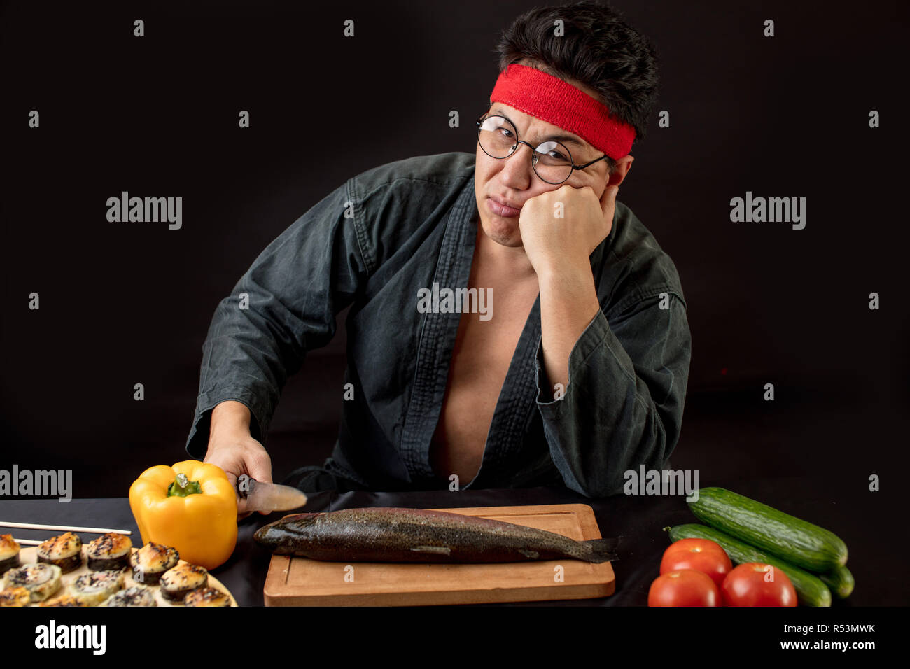 People, tiredness concept. Sad man after cooking in the kitchen. . Stock Photo
