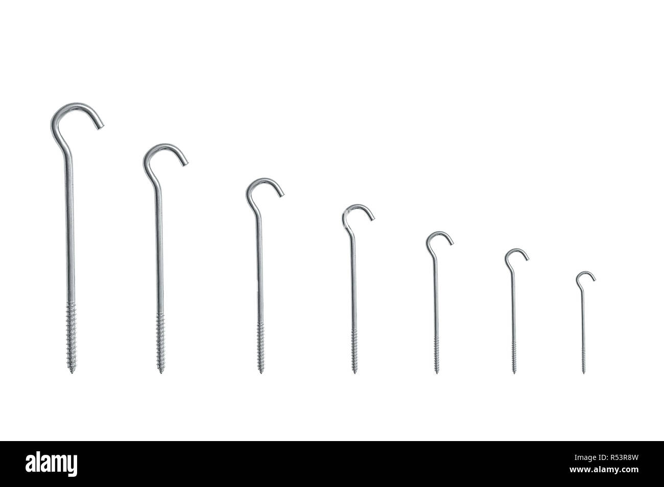 Metal hooks screws of different sizes. White isolate Stock Photo Alamy