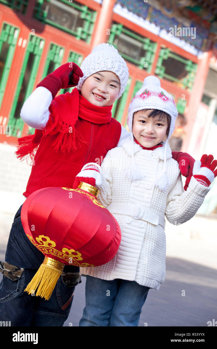 Children holding red lantern Stock Photo