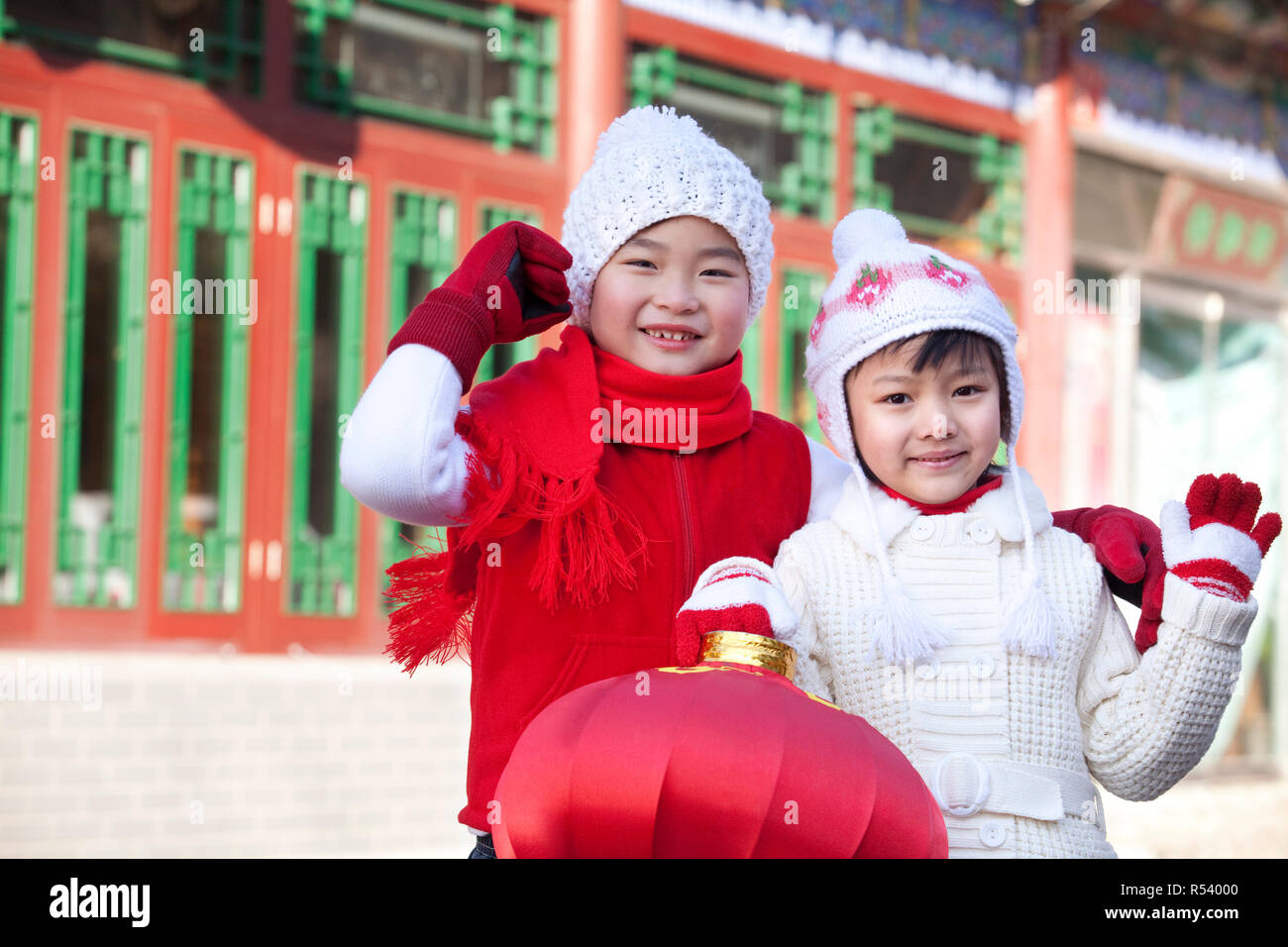 Children holding red lantern Stock Photo