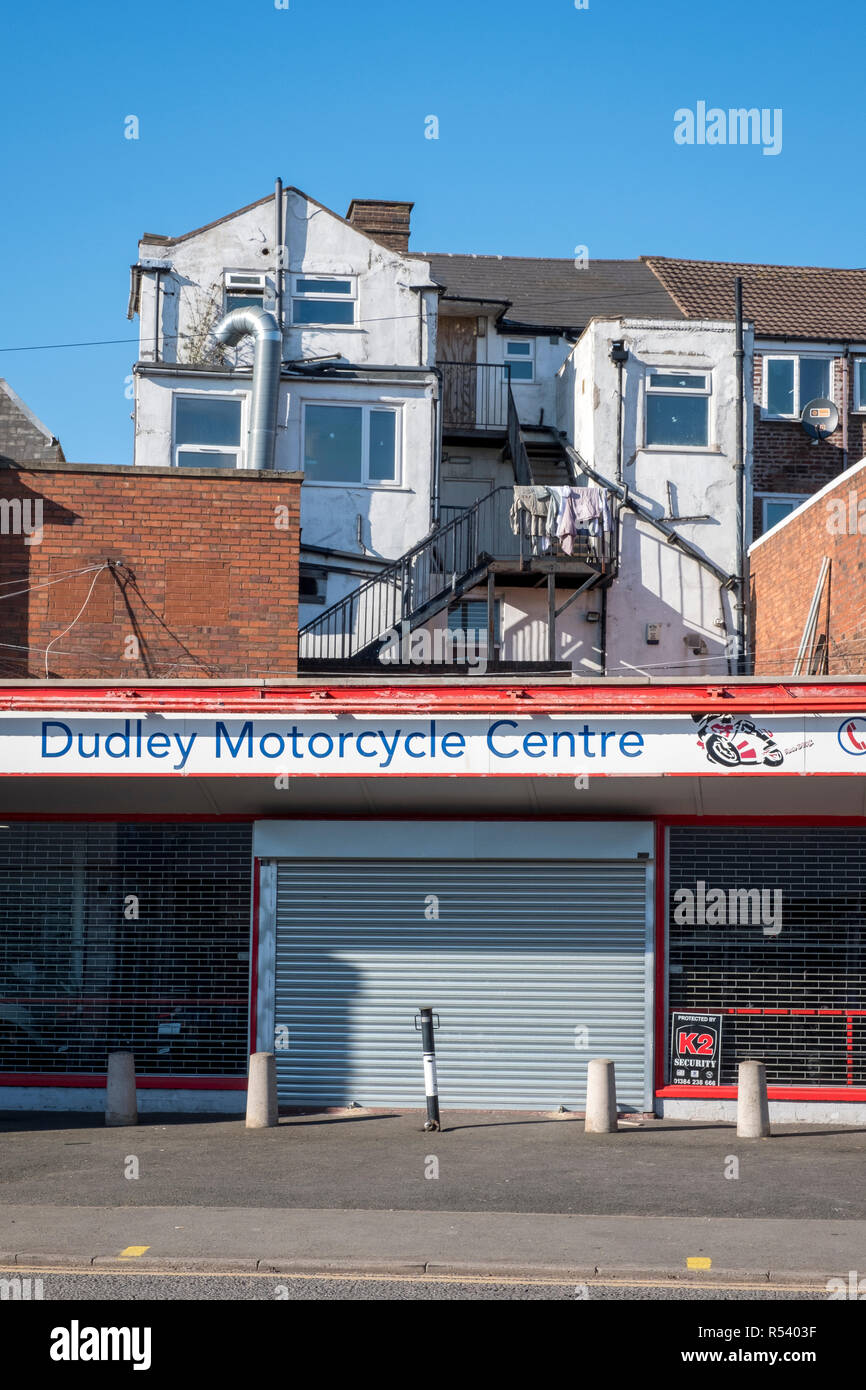 Houses divided into apartments above retail outlets, West Midlands, UK