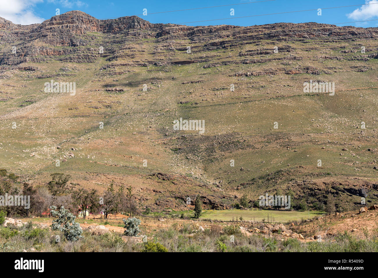 A view of Skilpaddorp in the Cederberg Mountains of the Western Cape Province of South Africa. A school building and rugby field are visible Stock Photo