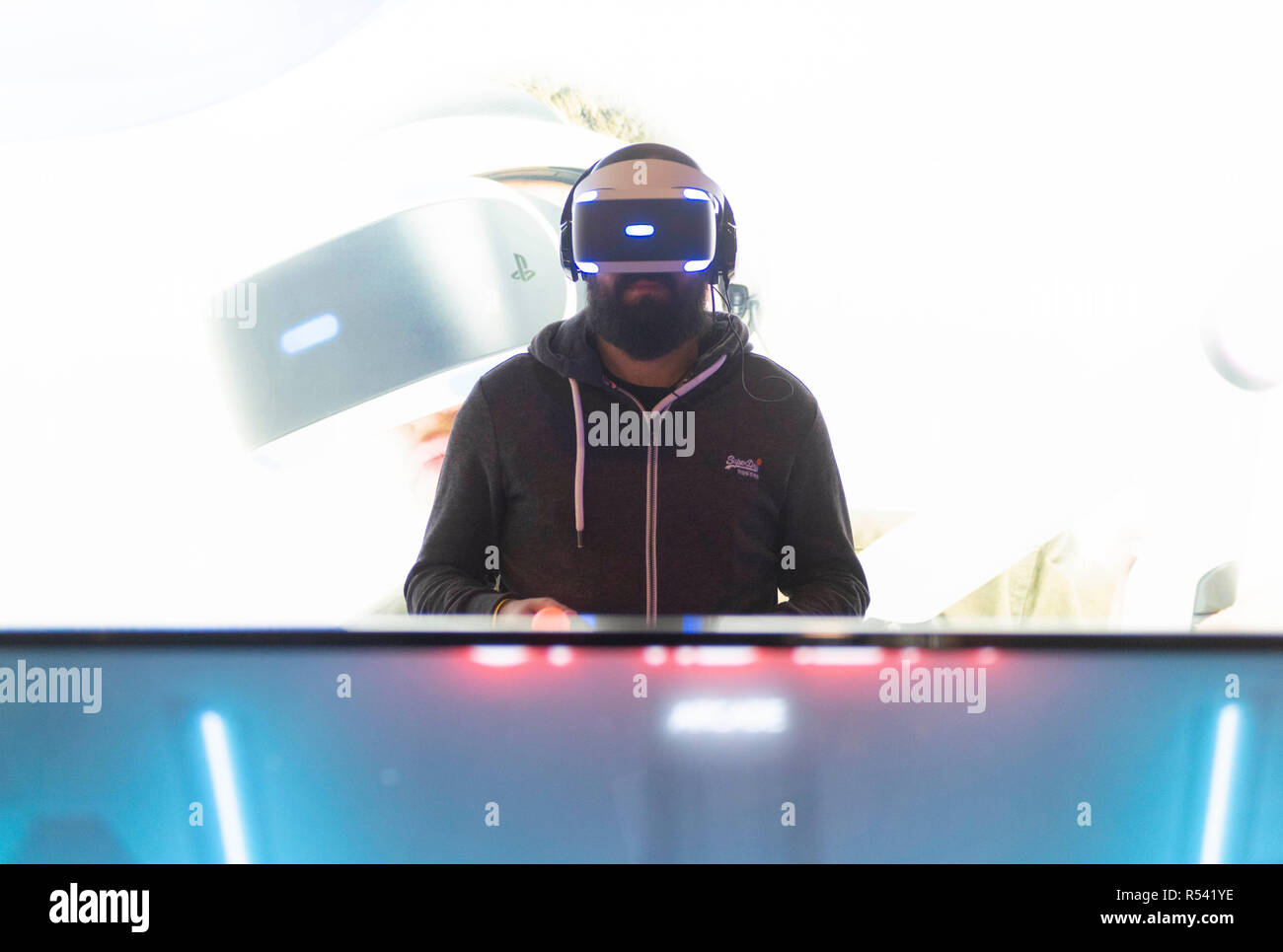 Barcelona, Spain. 29th November, 2018. A man playing video games with 3D virtual reality glasses during the Barcelona Games World 2018 at Gran Via Fira on November 28, 2018 in Barcelona, Spain. © Victor Puig/Alamy Live News Stock Photo