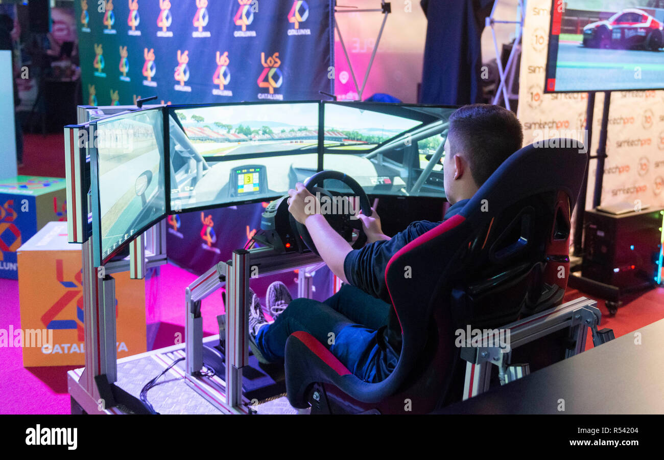 Barcelona, Spain. 29th November, 2018. A man playing driving video games during the Barcelona Games World 2018 at Gran Via Fira on November 28, 2018 in Barcelona, Spain. © Victor Puig/Alamy Live News Stock Photo