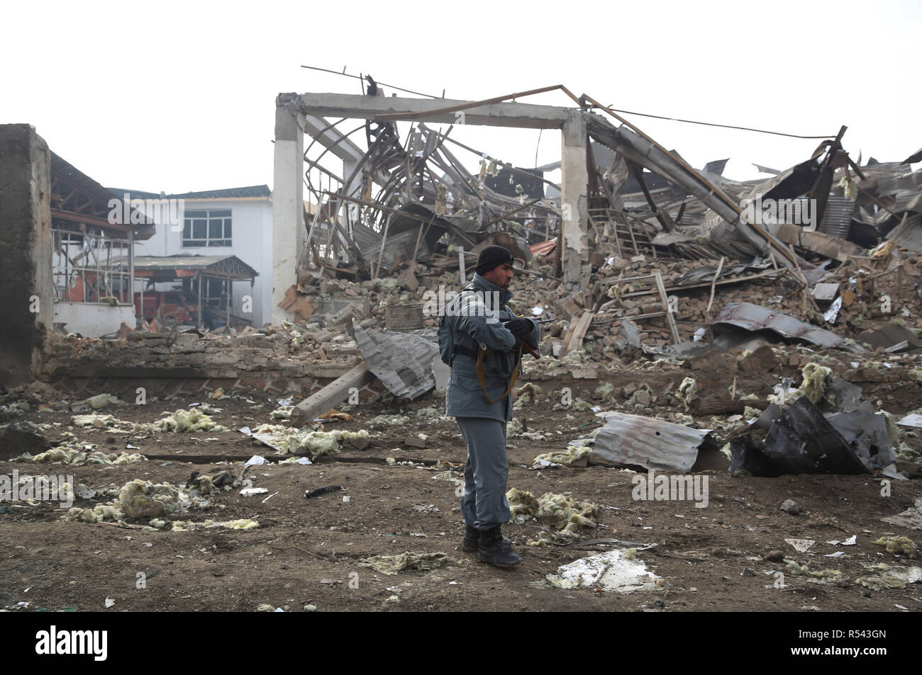 Kabul, Afghanistan. 29th Nov, 2018. An Afghan security force member stands guard at the site of an attack in Kabul, capital of Afghanistan on Nov. 29, 2018. The death toll soared to 15 in the car bomb attack in Kabul that targeted London-based Security contractor company G4S on Wednesday night, Afghanistan's Interior Ministry spokesman Najib Danish confirmed Thursday. Credit: Rahmat Alizadah/Xinhua/Alamy Live News Stock Photo
