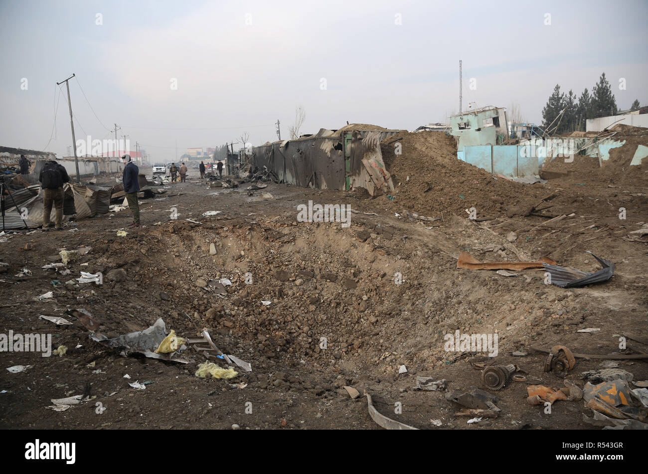 Kabul, Afghanistan. 29th Nov, 2018. Photo taken on Nov. 29, 2018 shows the site of an attack in Kabul, capital of Afghanistan. The death toll soared to 15 in the car bomb attack in Kabul that targeted London-based Security contractor company G4S on Wednesday night, Afghanistan's Interior Ministry spokesman Najib Danish confirmed Thursday. Credit: Rahmat Alizadah/Xinhua/Alamy Live News Stock Photo