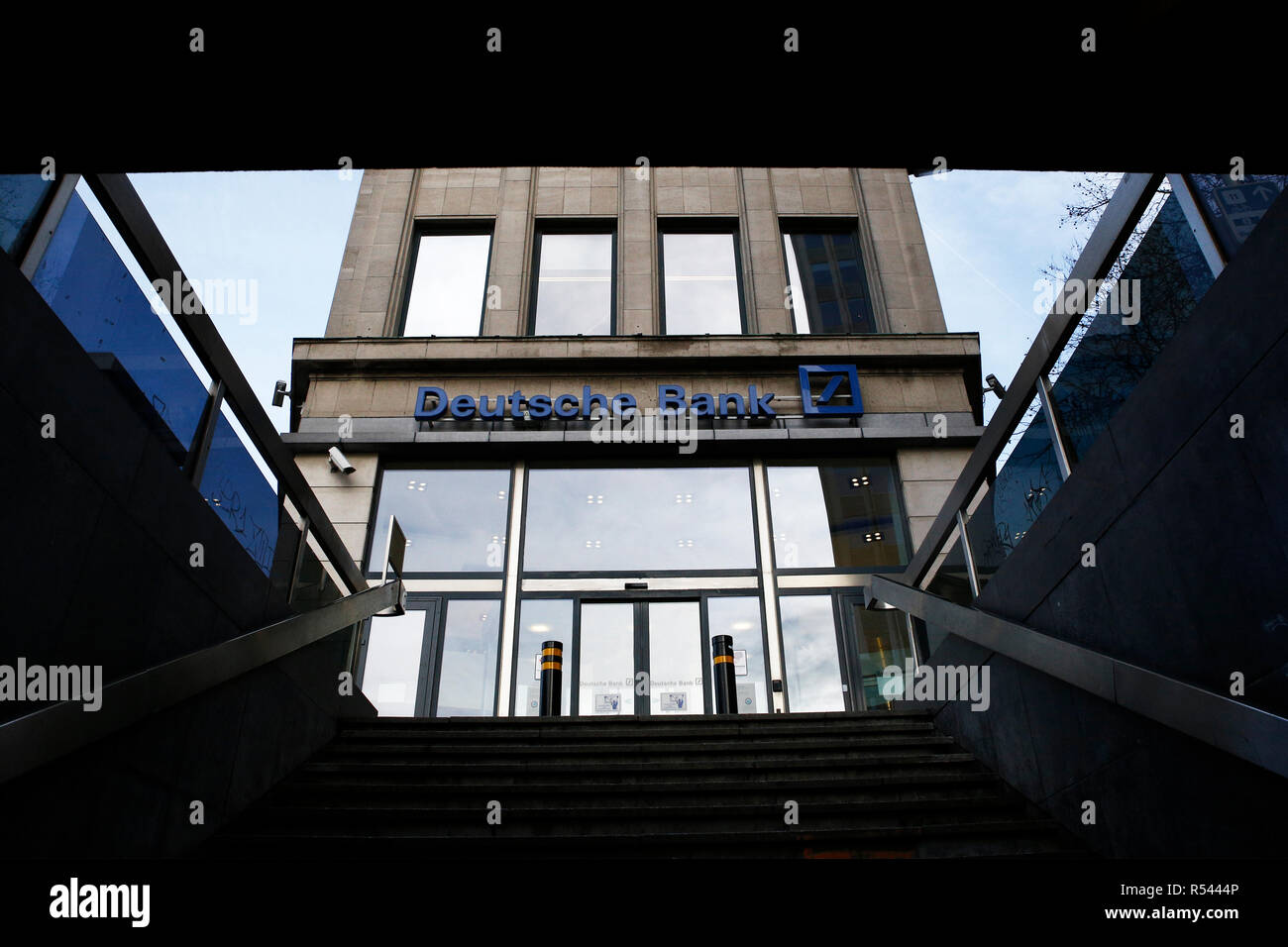 Brussels, Belgium. 29th Nov, 2018. Exterior view of Deutsche Bank branch. A large contingent of investigators searched the headquarters of the largest German money house in Frankfurt. The suspicion: Group employees helped customers set up so-called offshore companies in tax havens and launder money from criminal activities. Credit: ALEXANDROS MICHAILIDIS/Alamy Live News Stock Photo