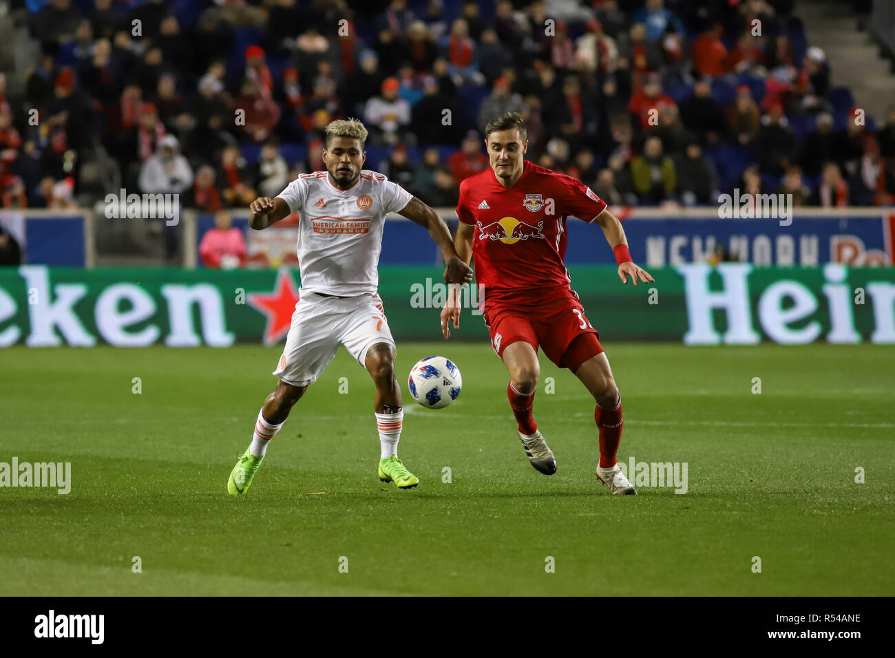 Harrison, NJ, USA. 29th Nov 2018. Aaron Long (33) and Josef Martinez (7) battle for a ball in the first half. Credit: Ben Nichols/Alamy Live News Stock Photo