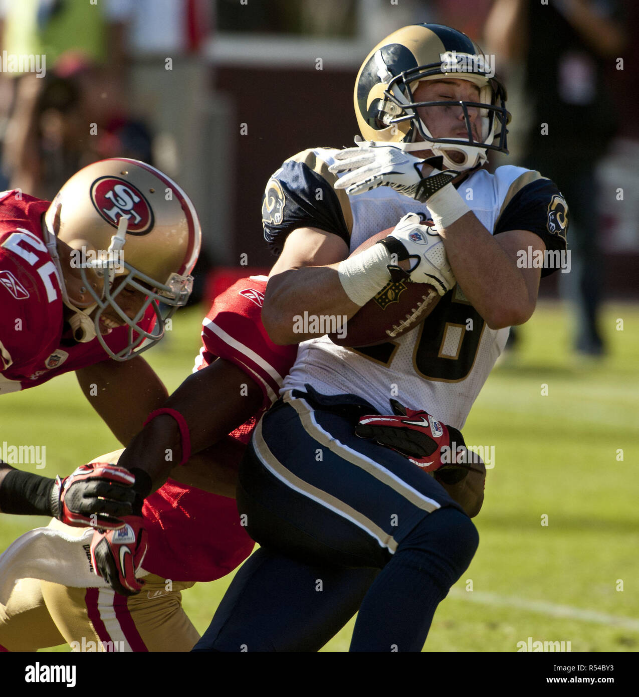 San Francisco, California, USA. 14th Nov, 2010. an Francisco 49ers cornerback Nate Clements #22 and safety Reggie Smith #30 tackle St. Louis Rams wide receiver Danny Amendola #16 on Sunday, November 14, 2010 at Candlestick Park, San Francisco, California. The 49ers defeated the Rams 23-20. Credit: Al Golub/ZUMA Wire/Alamy Live News Stock Photo