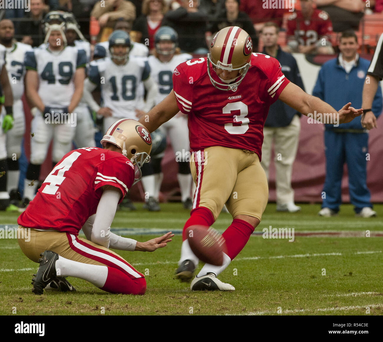 San Francisco, California, USA. 12th Dec, 2010. San Francisco 49ers punter Andy Lee (4) holding place kicker Jeff Reed (3) make field goal on Sunday, December 12, 2010 at Candlestick Park, San Francisco, California. The 49ers defeated the Seahawks 40-21. Credit: Al Golub/ZUMA Wire/Alamy Live News Stock Photo