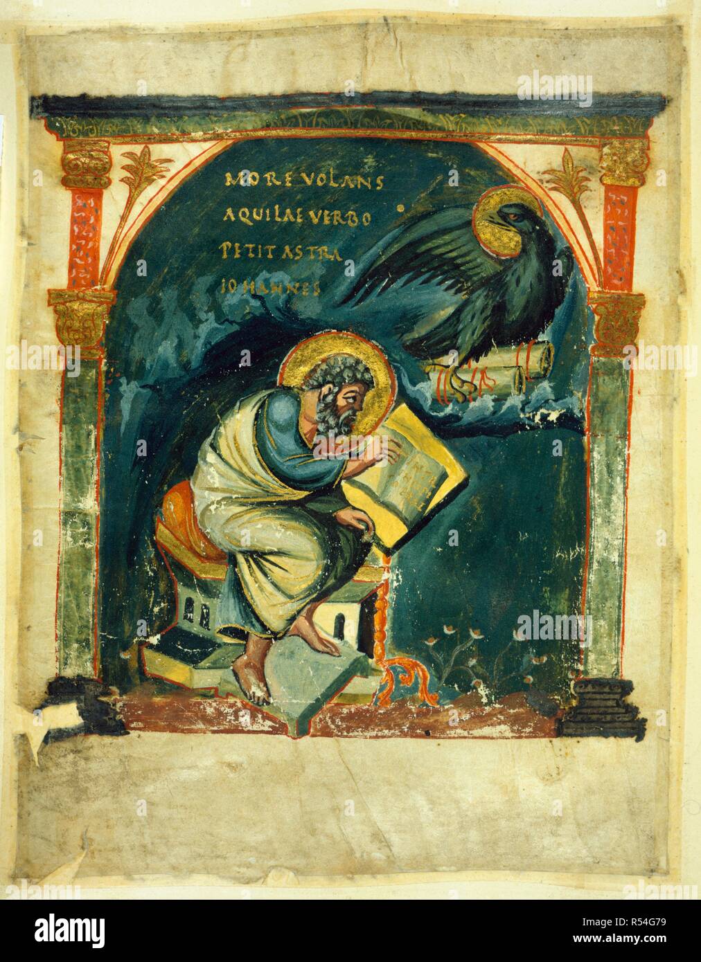 St. John seated. Coronation Gospels. S. Netherlands [Lobbes, near Liege]; circa 897-900. [Whole folio] St. John writing his gospel, with his symbol, the eagle, holding a scroll. The gospels were possibly a gift from Emperor Otto I of Germany to Athelstan, who presented them to Christ Church, Canterbury, and were used as the Coronation Book of the Anglo Saxon kings  Image taken from Coronation Gospels.  Originally published/produced in S. Netherlands [Lobbes, near Liege]; circa 897-900. . Source: Cotton Tiberius A. II, f.164v. Language: Latin. Stock Photo