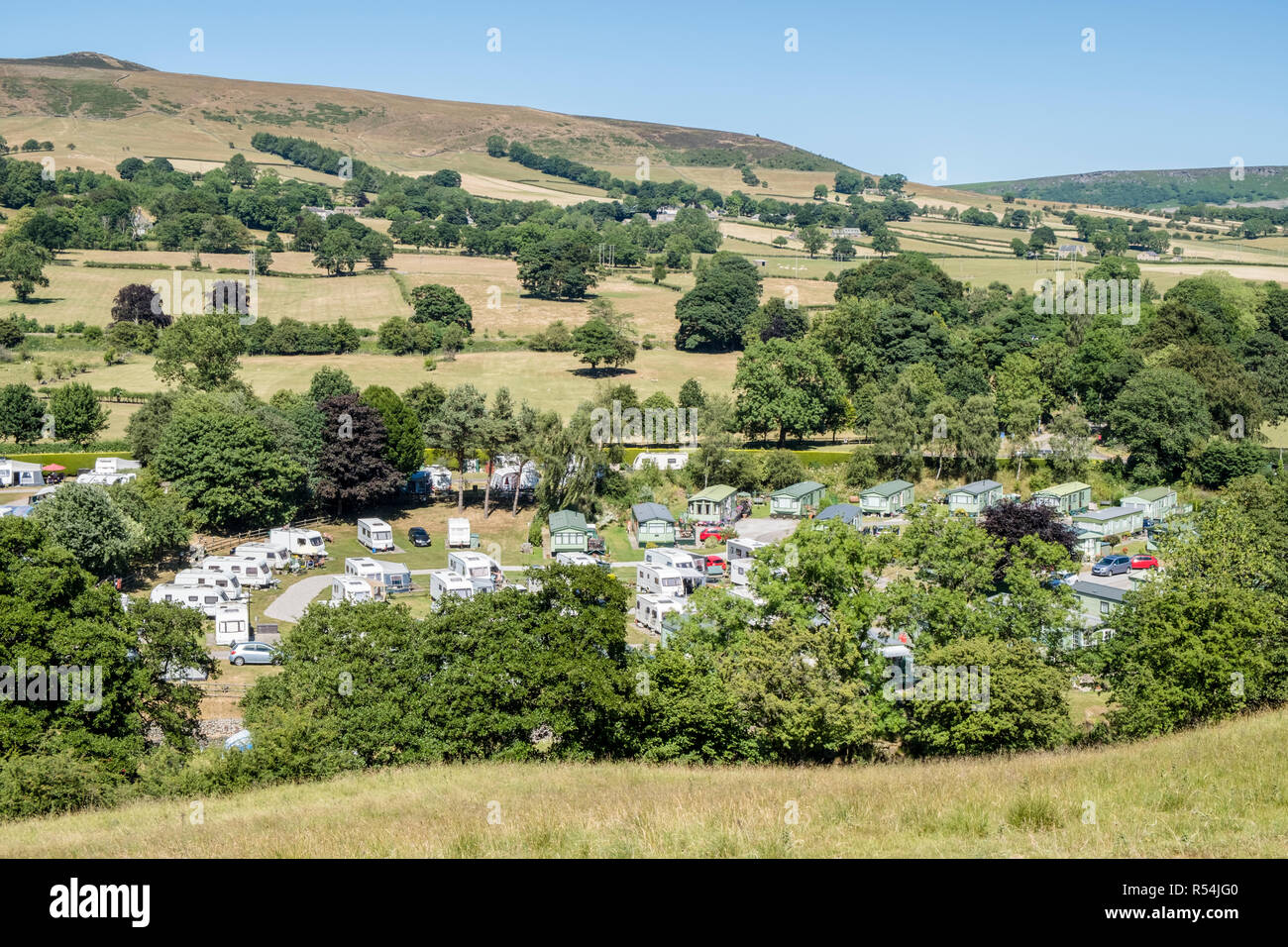 Caravans at a caravan park at the foot of Win Hill in the countryside near Hope, Derbyshire, Peak District National Park, England, UK Stock Photo