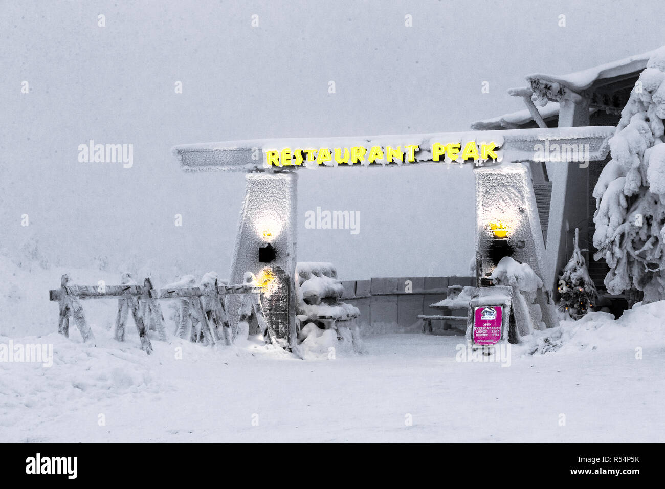 One of a series depicting scenes around Ruka during a particularly heavy snowstorm. This scene is of the Peak restaurant where, according to my son, t Stock Photo