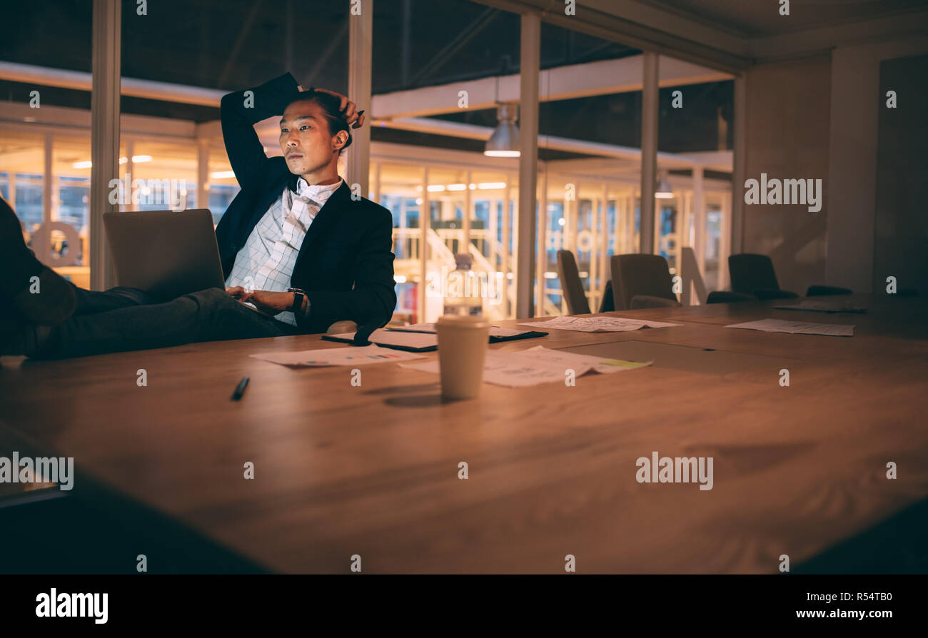 Legs on table in office hi-res stock photography and images - Alamy