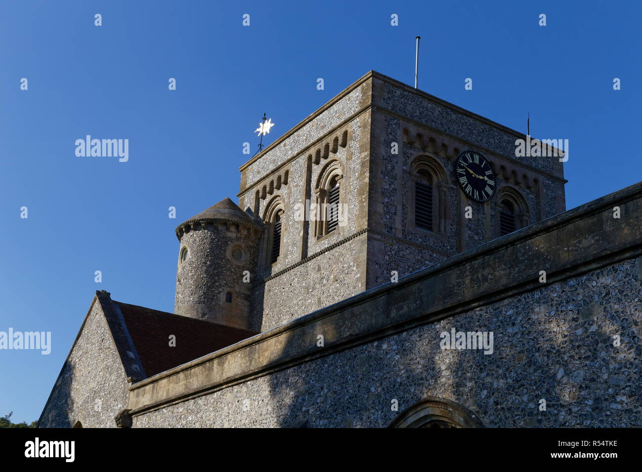 St Mary's church roof spire and clock Kingsclere Hampshire Stock Photo