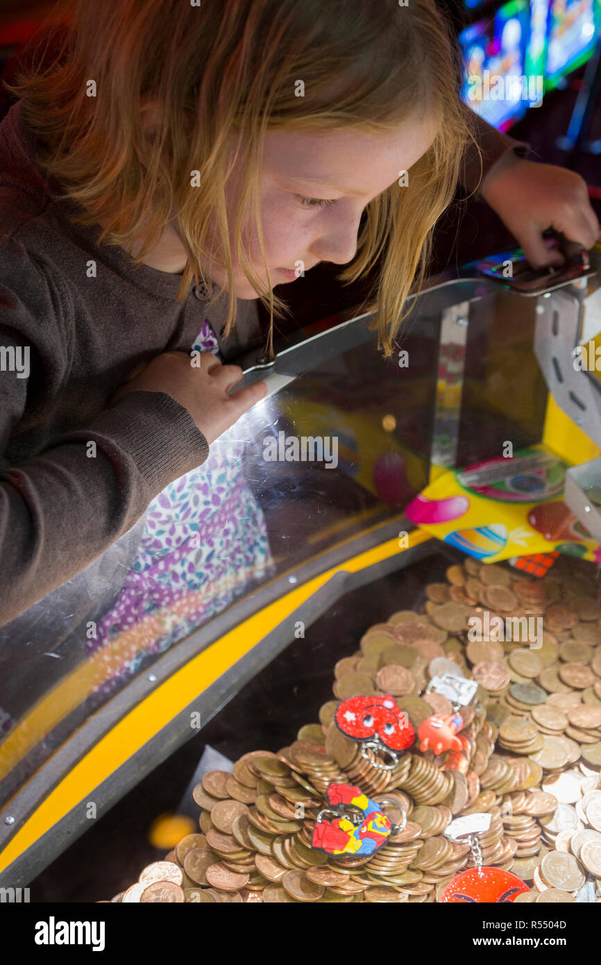 Coin pusher machine hi-res stock photography and images - Alamy