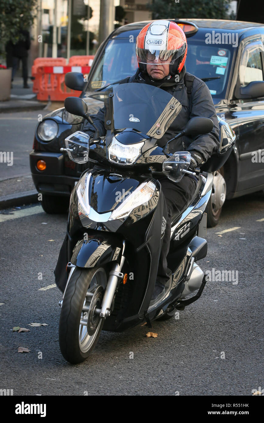 Dire Straits Singer Mark Knopfler seen riding this motorbike after  promoting his new album 'Down The Road Wherever' at BBC Radio Two Studios -  London Featuring: Mark Knopfler Where: London, United Kingdom