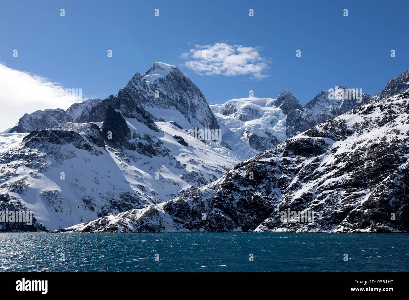 View of the spectacular Drygalski Fjord with snow covered mountains on South Georgia Island in the South Atlantic Island, Antarctica Stock Photo