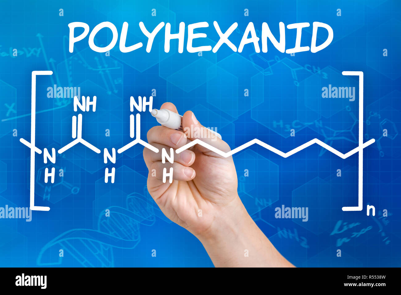 hand with pen draws chemical structural formula of polyhexanide Stock ...