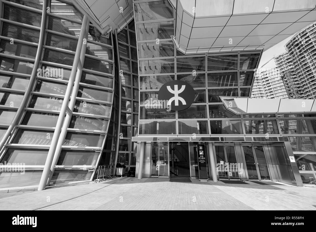 West Kowloon, Hong Kong - November 19, 2018: Main entrance of West Kowloon High Speed Rail Station in Hong Kong operated by MTR. Stock Photo