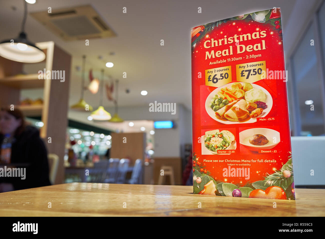 Christmas menu on a table at the Morrisons cafe in Corby, England Stock