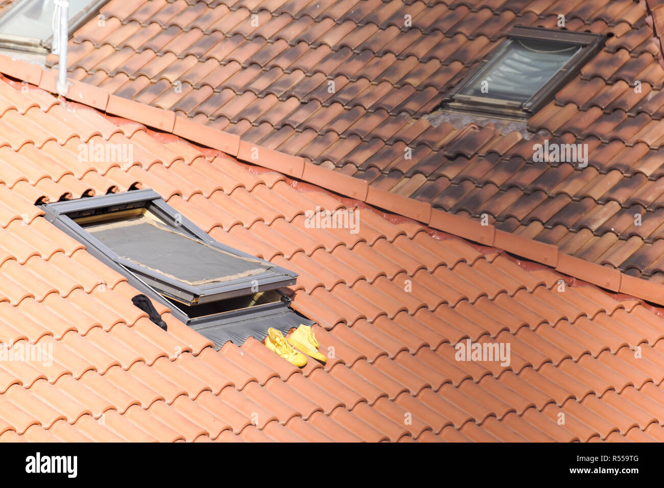 Roof window with roller shutter . Stock Photo