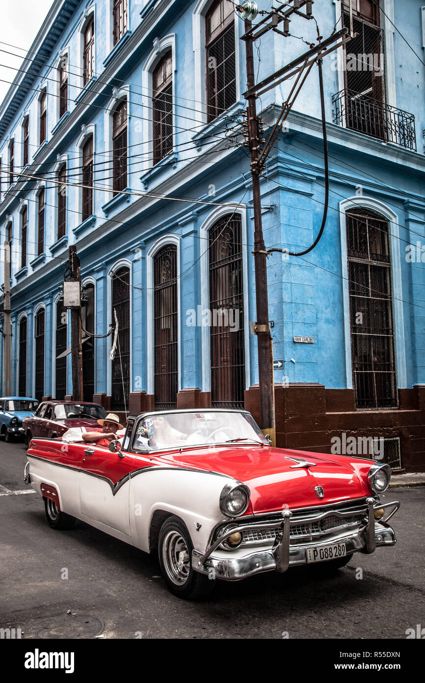 Classic cadilac driving the streets of Havana Stock Photo