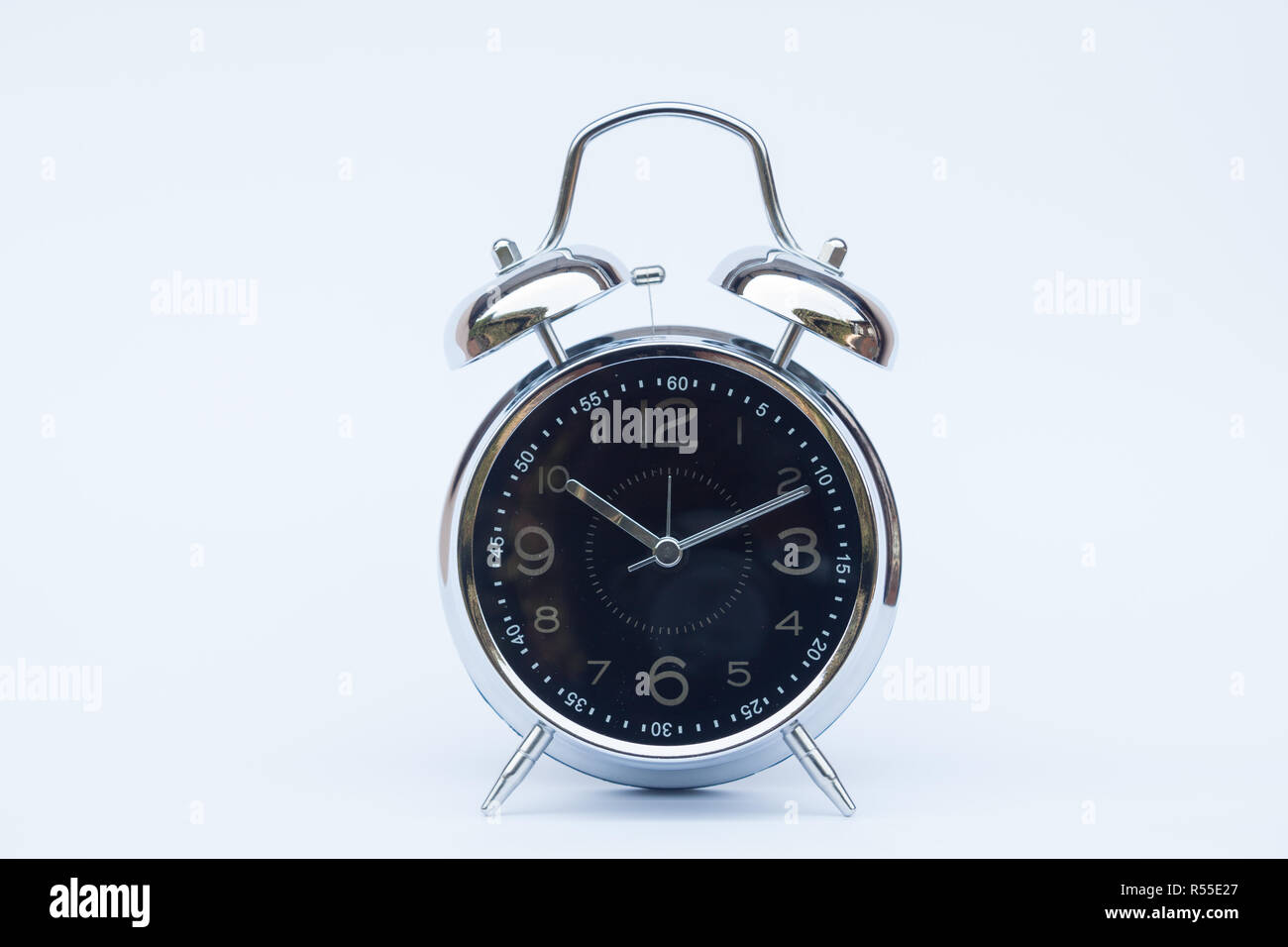 Alarm clock isolated on white background Stock Photo - Alamy