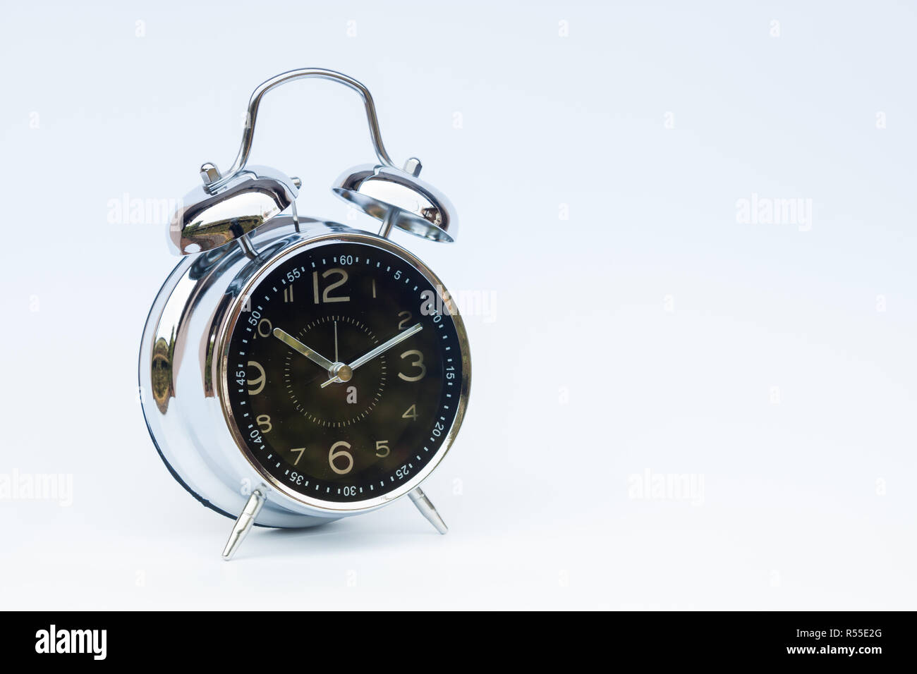 Alarm clock isolated on white background Stock Photo - Alamy