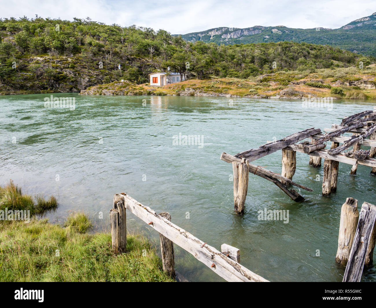 Lapataia River with house and old jetty, Tierra del Fuego National Park, Patagonia, Argentina Stock Photo