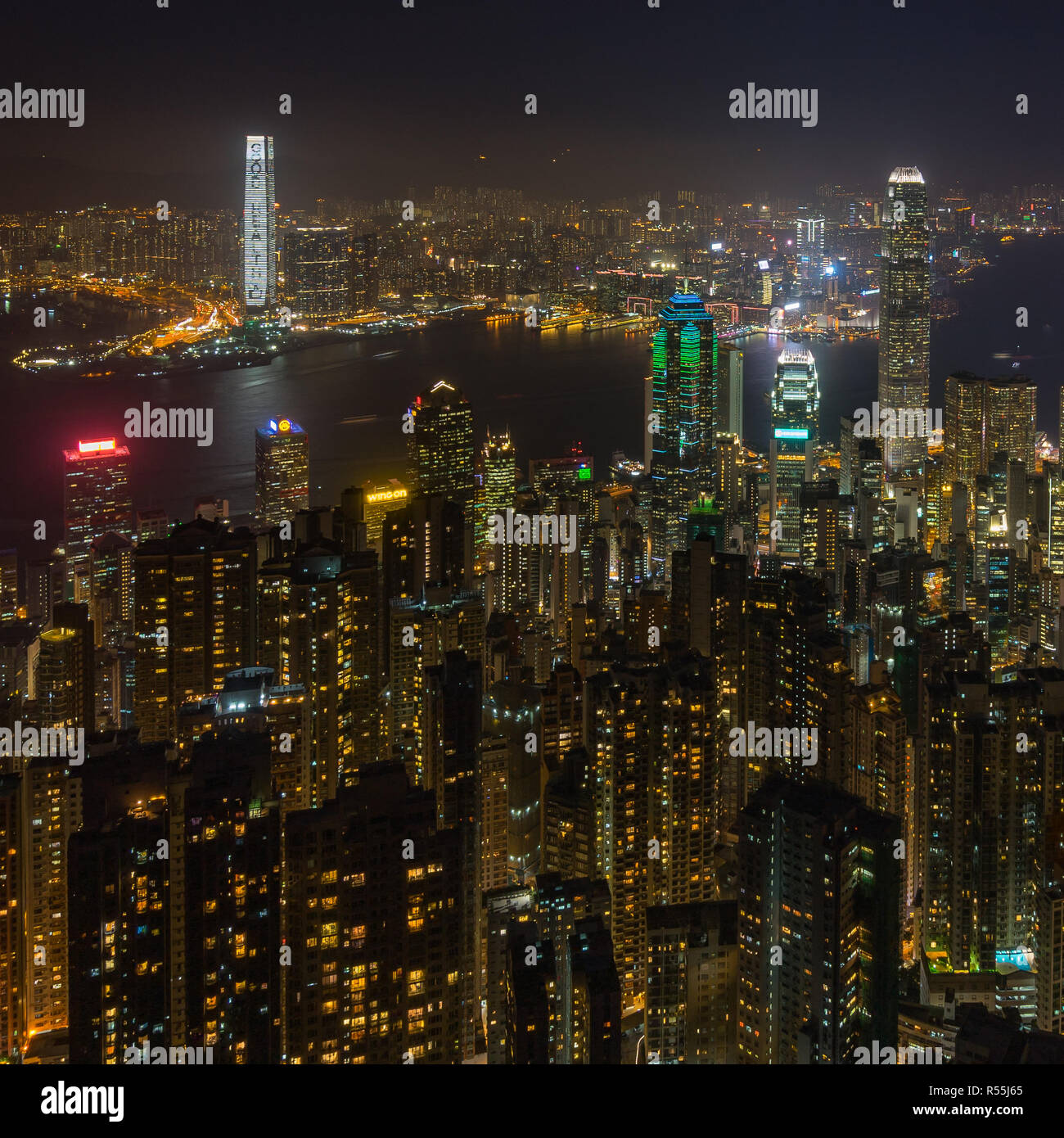 Square close up of Hong Kong and Victoria Harbour at night. Hong Kong, January 2018 Stock Photo