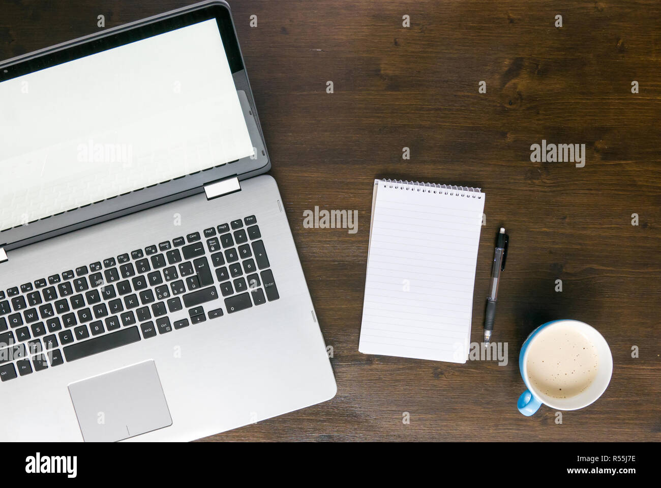 Person taking notes coffee laptop hi-res stock photography and images ...