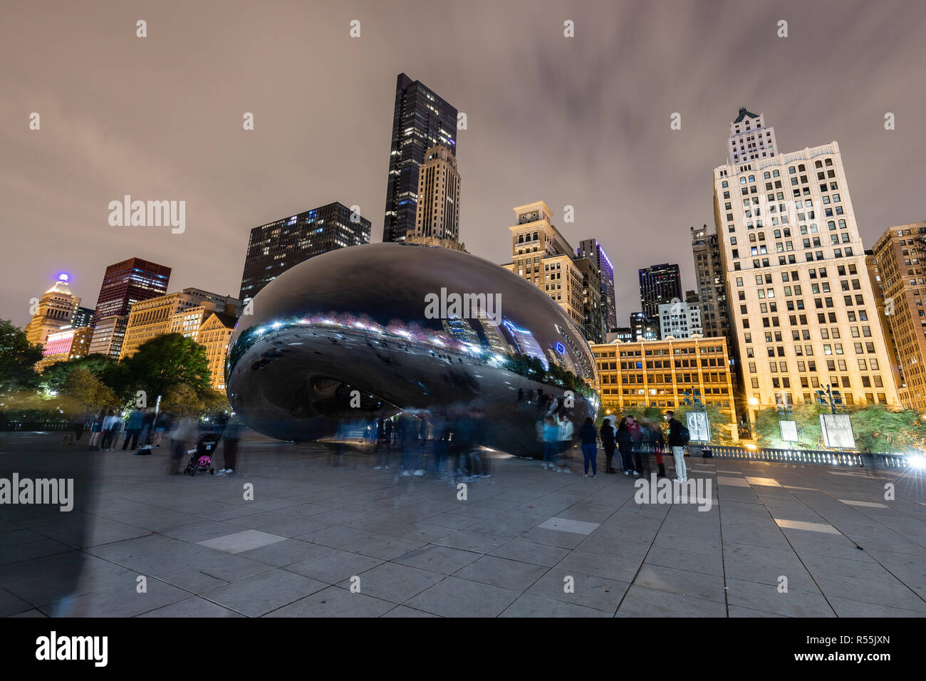 Cloud Gate, nicknamed "Bean," is located on Michigan Avenue within the cities Millennium Park, which features art, music, and theater to the public. Stock Photo