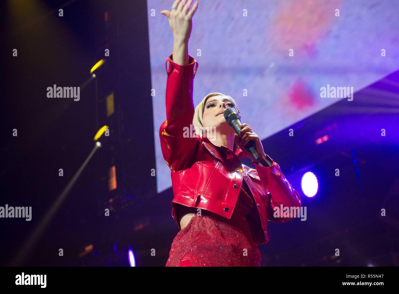 Bebe Rexha performing at the 2018 iHeartRadio Jingle Ball at American