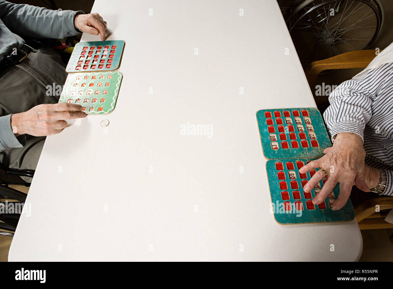 Two seniors playing bingo Stock Photo - Alamy