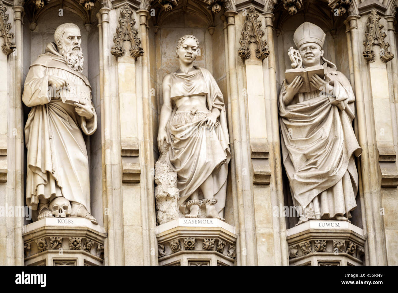 London England,UK,Westminster Abbey,Gothic Church,Protestant,exterior,Great West Door,statue,Modern Martyrs,Saint St Maximilian Kolbe,Manche Masemola, Stock Photo