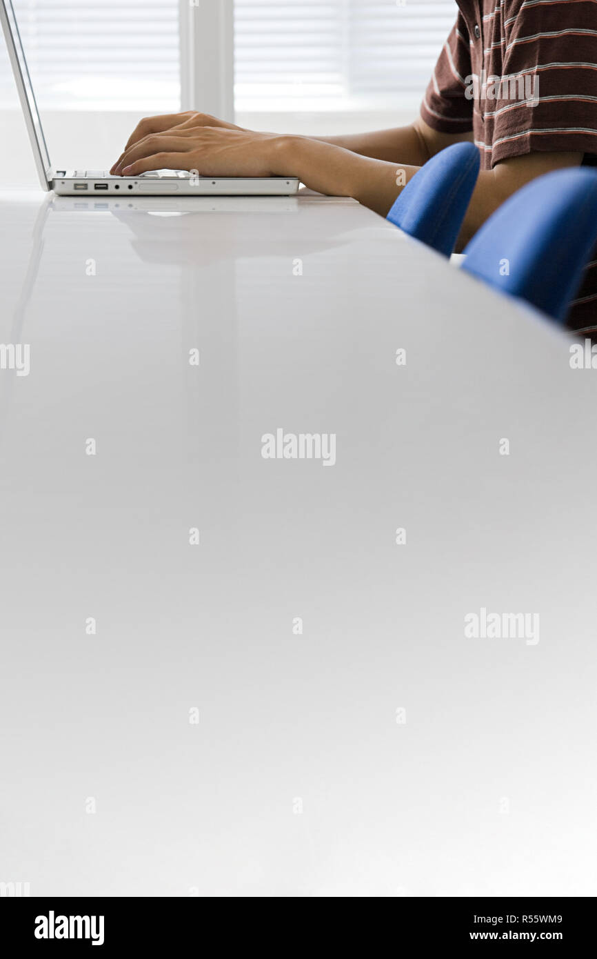 Person using laptop Stock Photo