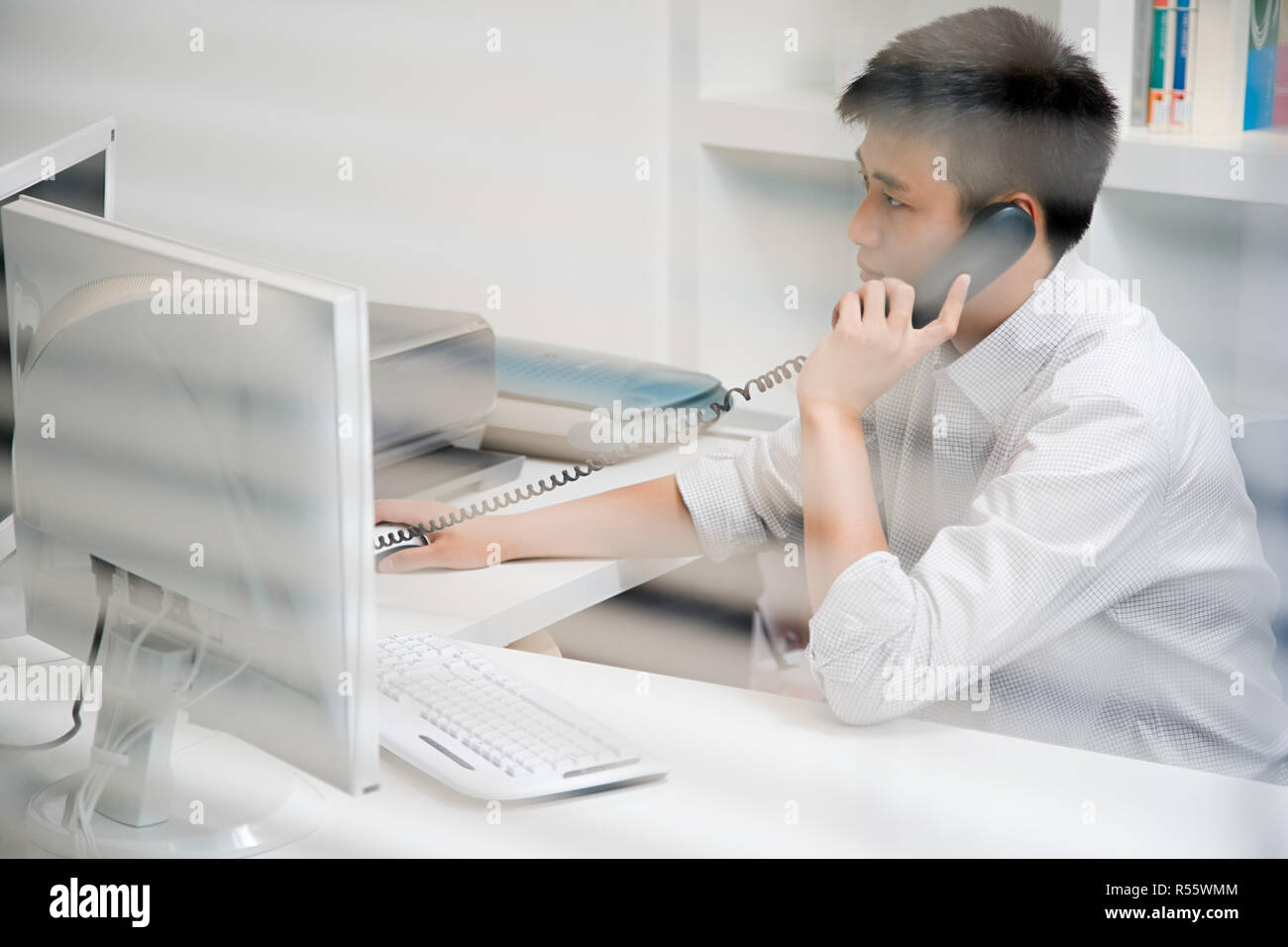 Man working in office Stock Photo