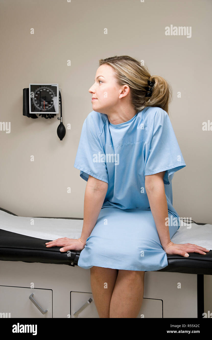 Woman hospital gown waiting hi-res stock photography and images - Alamy