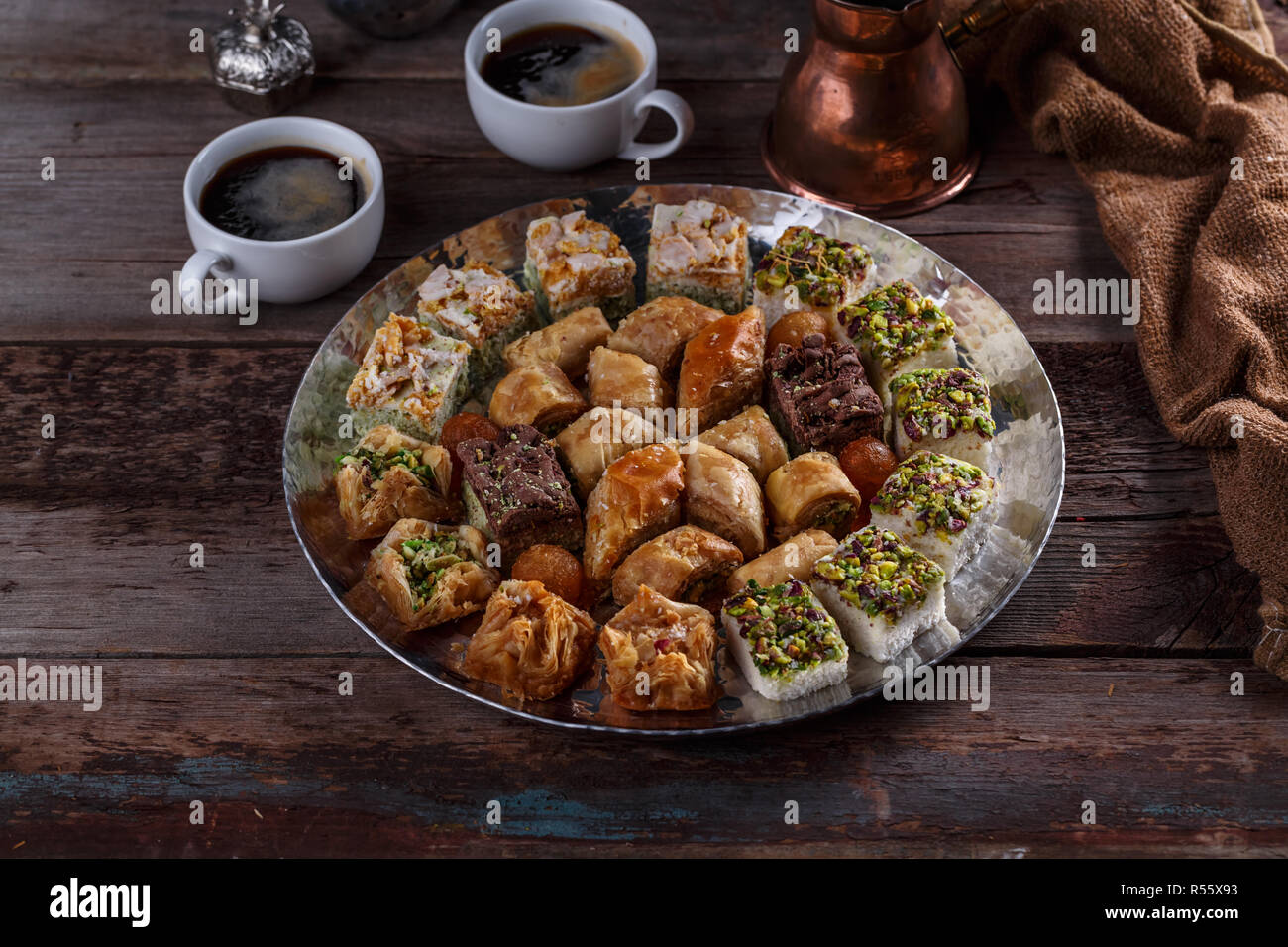 Oriental Baklava and delights on silver tray with coffee Stock Photo ...