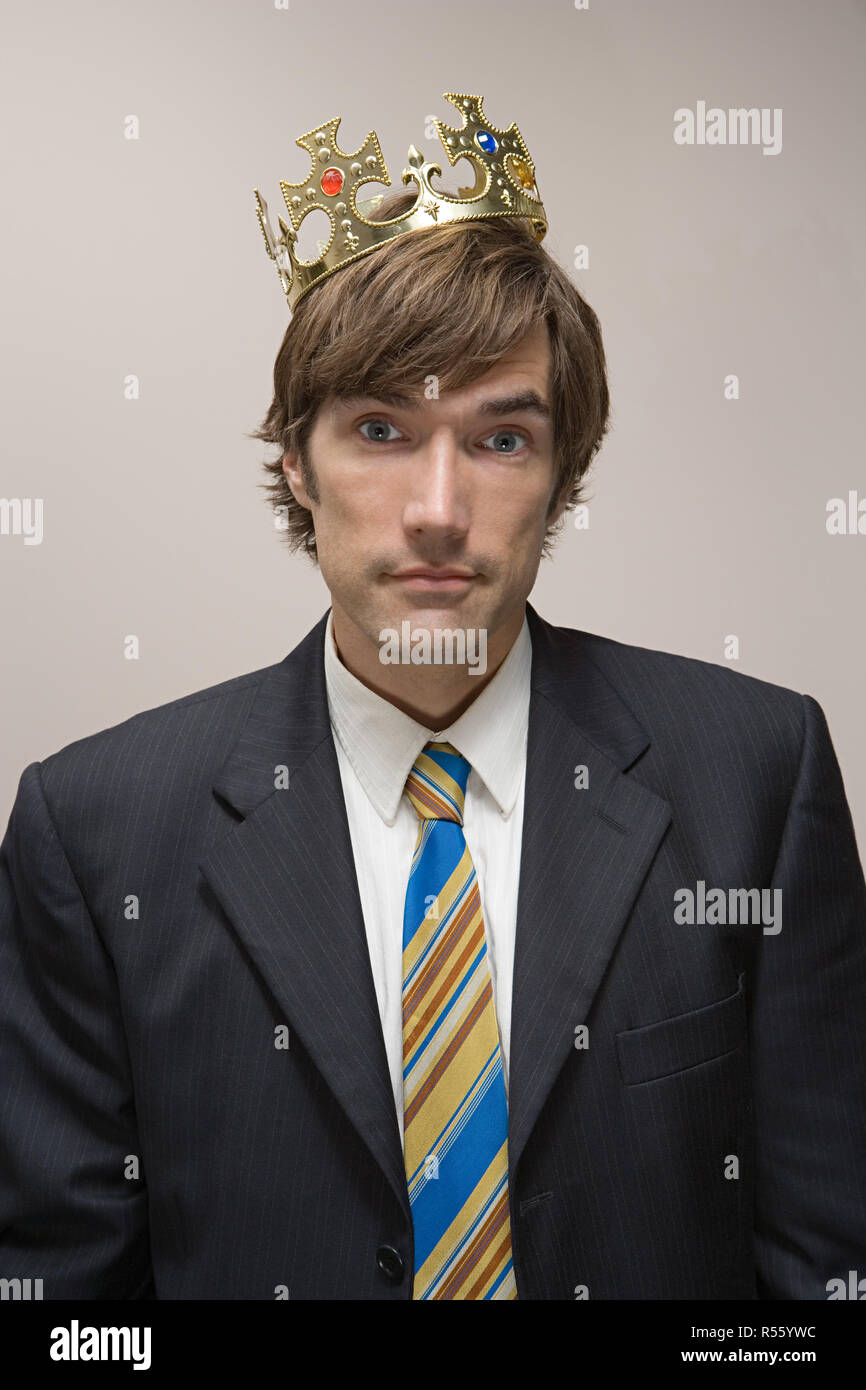 Man wearing a crown Stock Photo