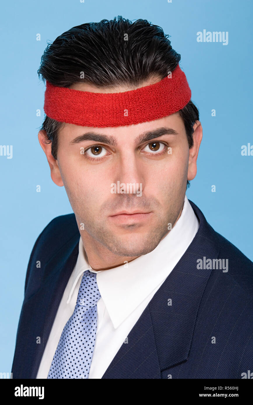 Businessman wearing a sweatband Stock Photo