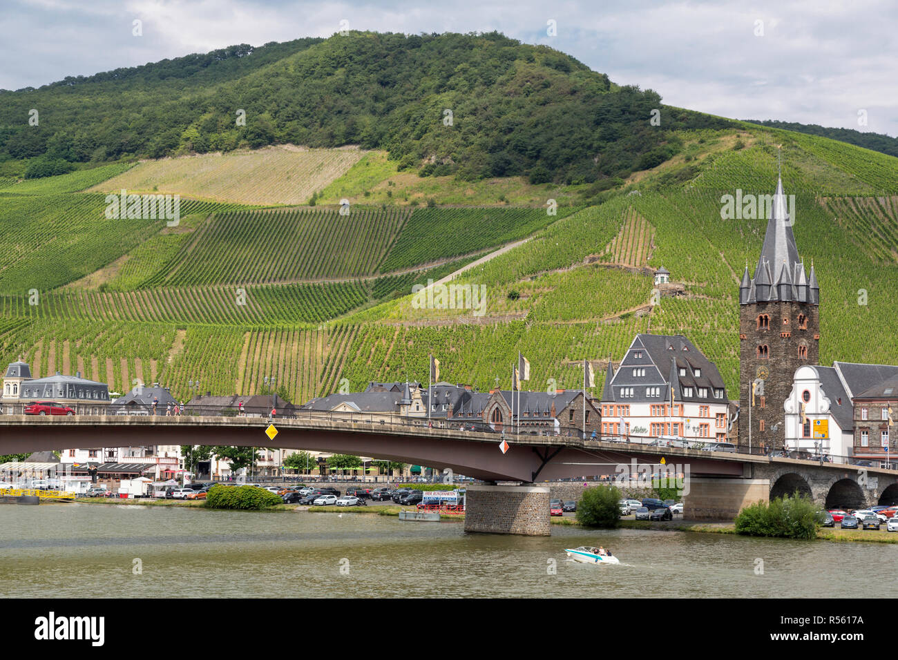 Bernkastel, Germany.  Bridge over the Moselle, Joining Bernkastel and Kues.  St. Michael's Church and Medieval Tower on right. Stock Photo
